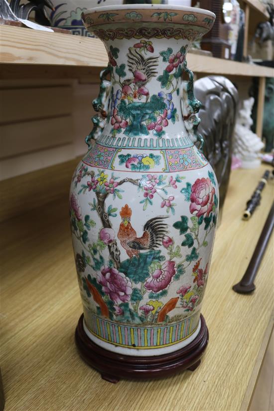 A Chinese famille rose vase on stand height excl. stand 44cm